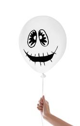 Photo of Woman holding spooky balloon for Halloween party on white background, closeup