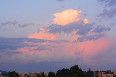 Picturesque view of beautiful sky with clouds over city at sunset