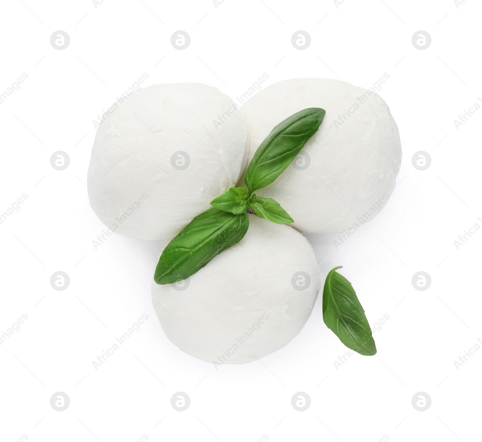 Photo of Delicious mozzarella cheese balls and basil on white background, top view