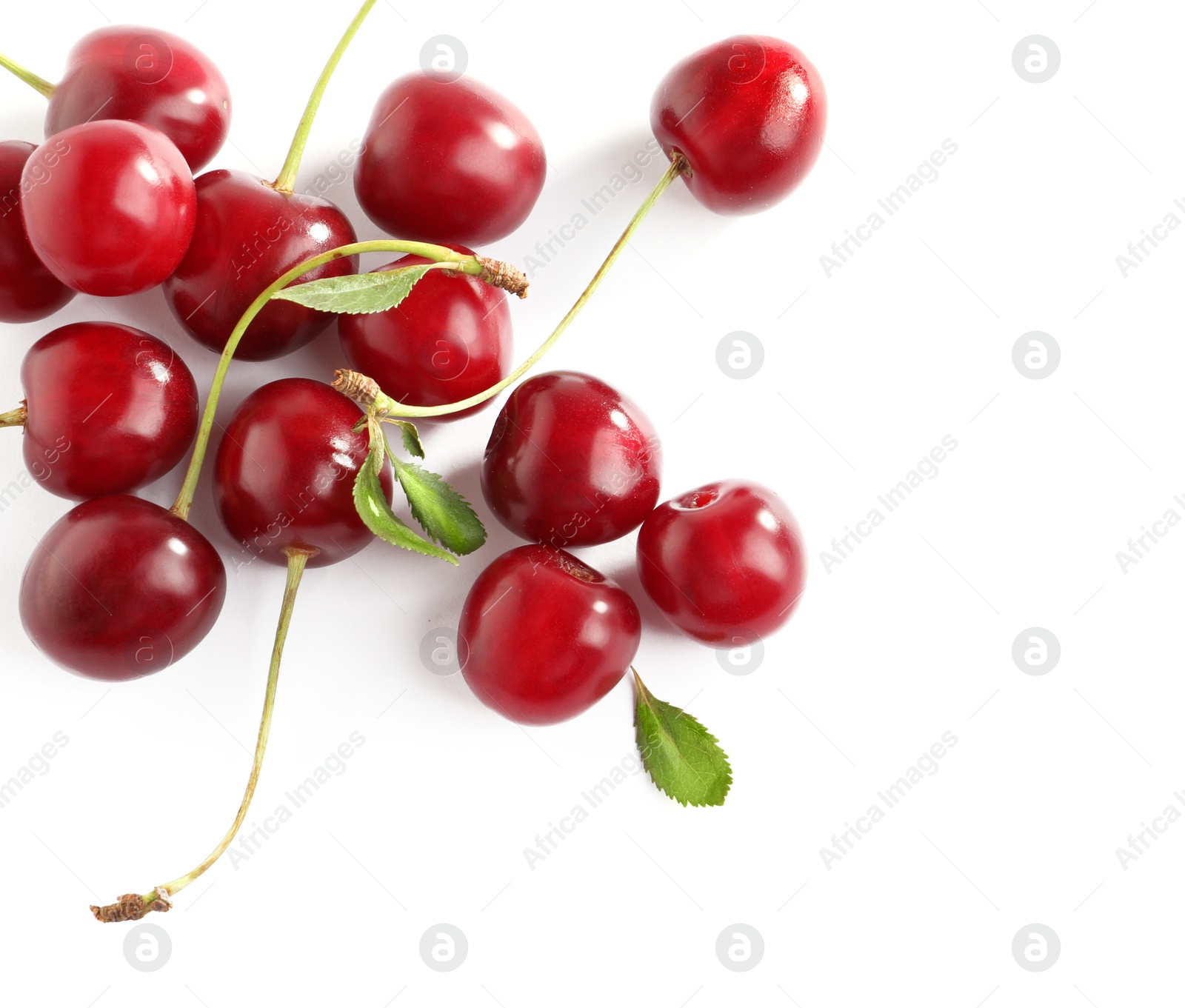 Photo of Pile of delicious ripe sweet cherries on white background, top view