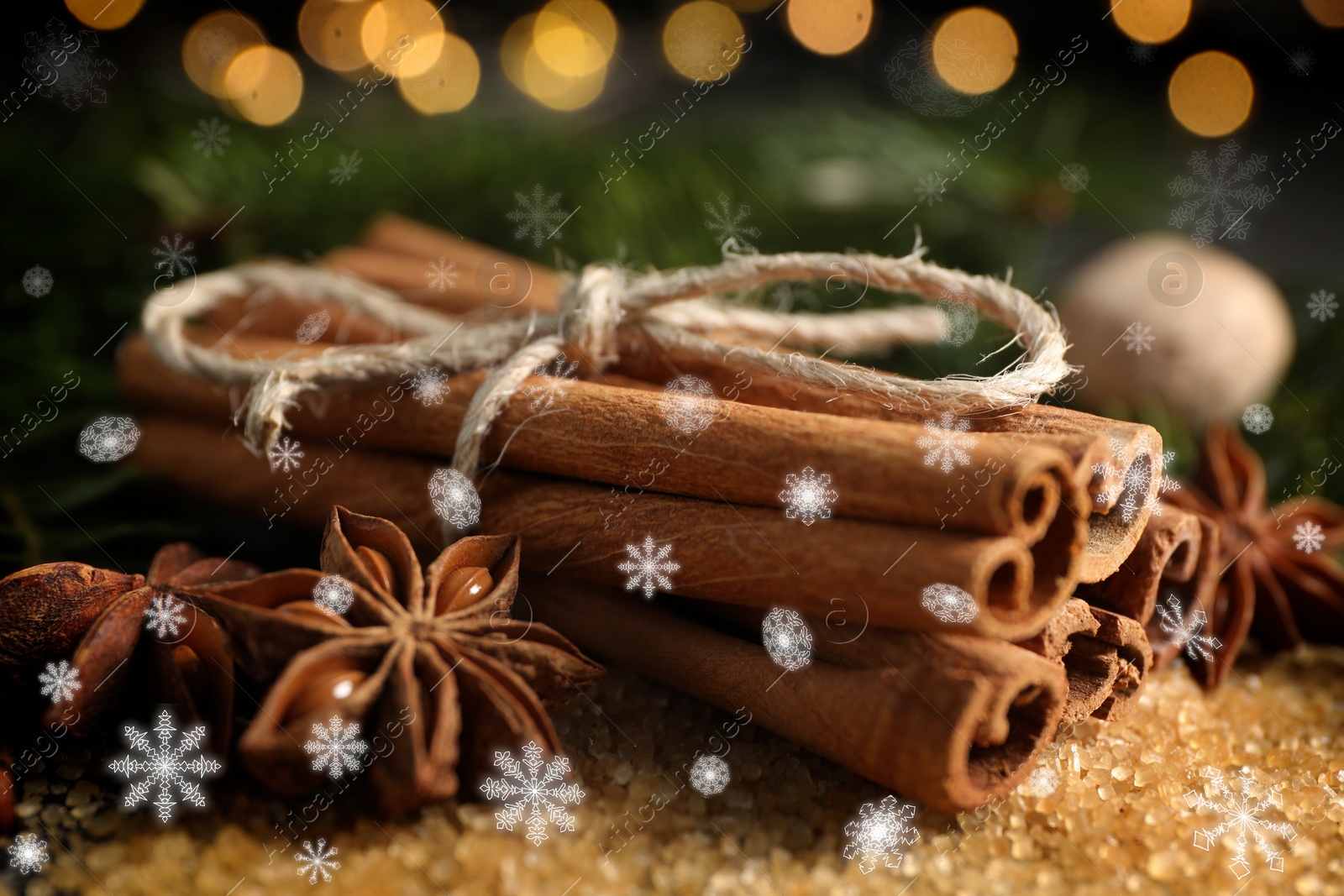 Image of Different spices, closeup. Cinnamon, anise on brown sugar. Bokeh effect