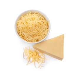 Photo of Grated and whole piece of cheese isolated on white, above view