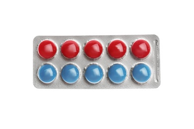 Photo of Pills in blister pack on white background, top view