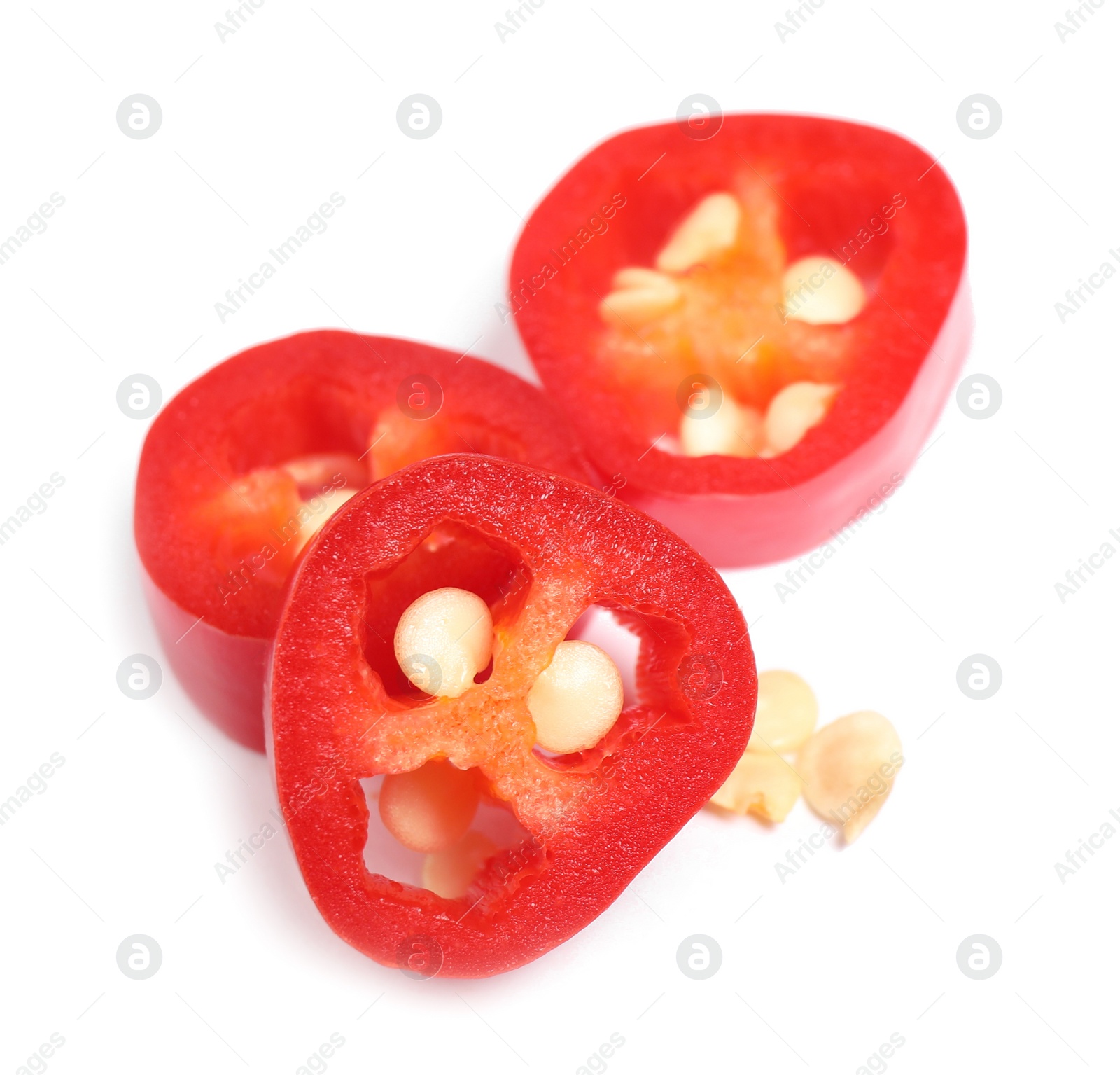 Photo of Cut red hot chili pepper on white background