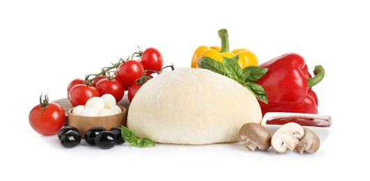 Photo of Fresh dough and ingredients for pizza on white background