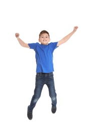 Portrait of boy jumping on white background