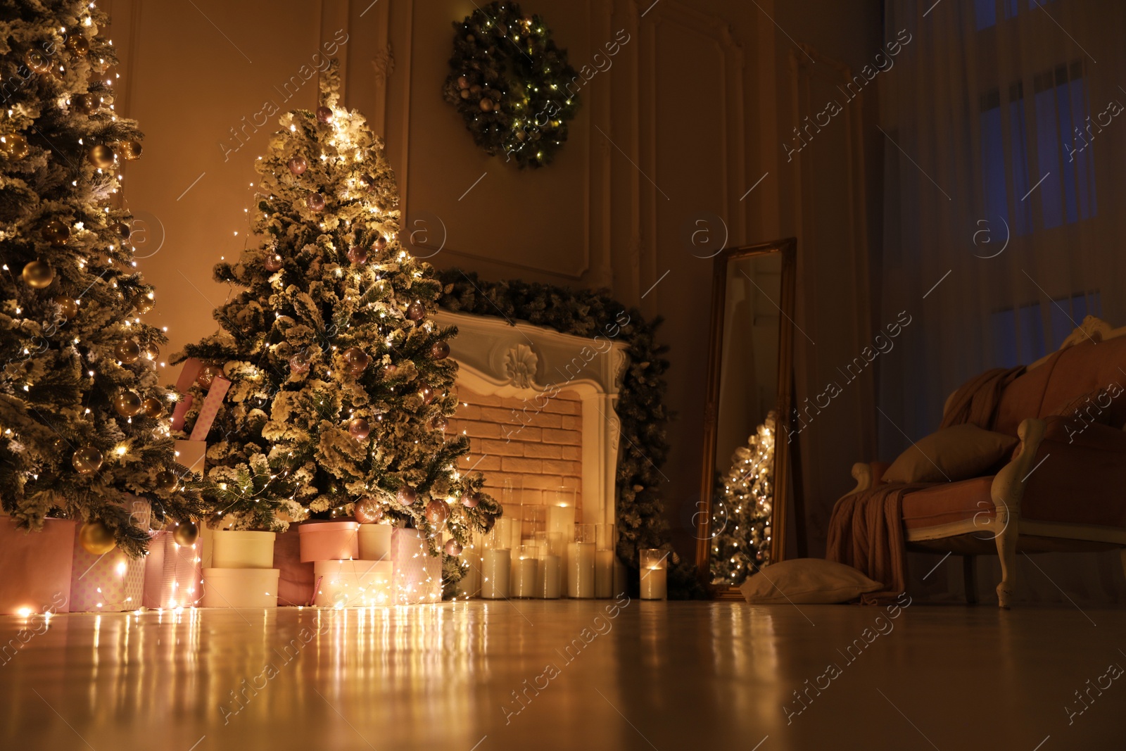 Photo of Festive room interior with beautiful Christmas trees