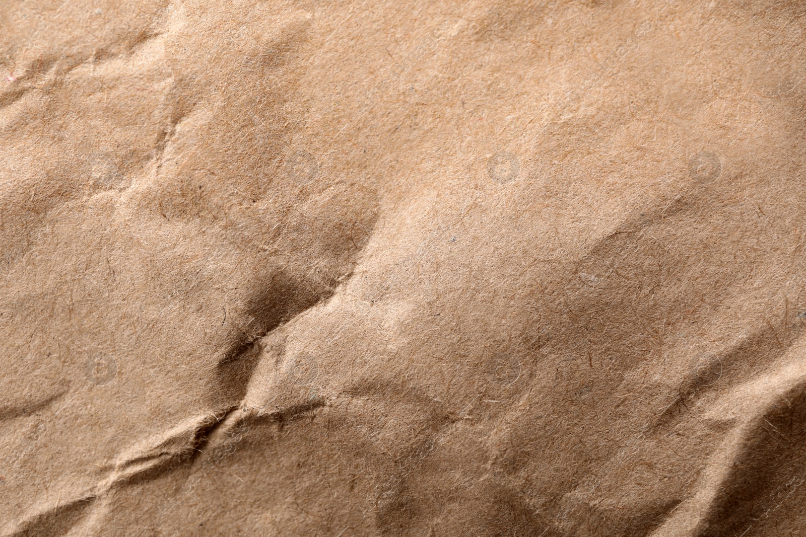 Photo of Brown paper bag texture as background, top view