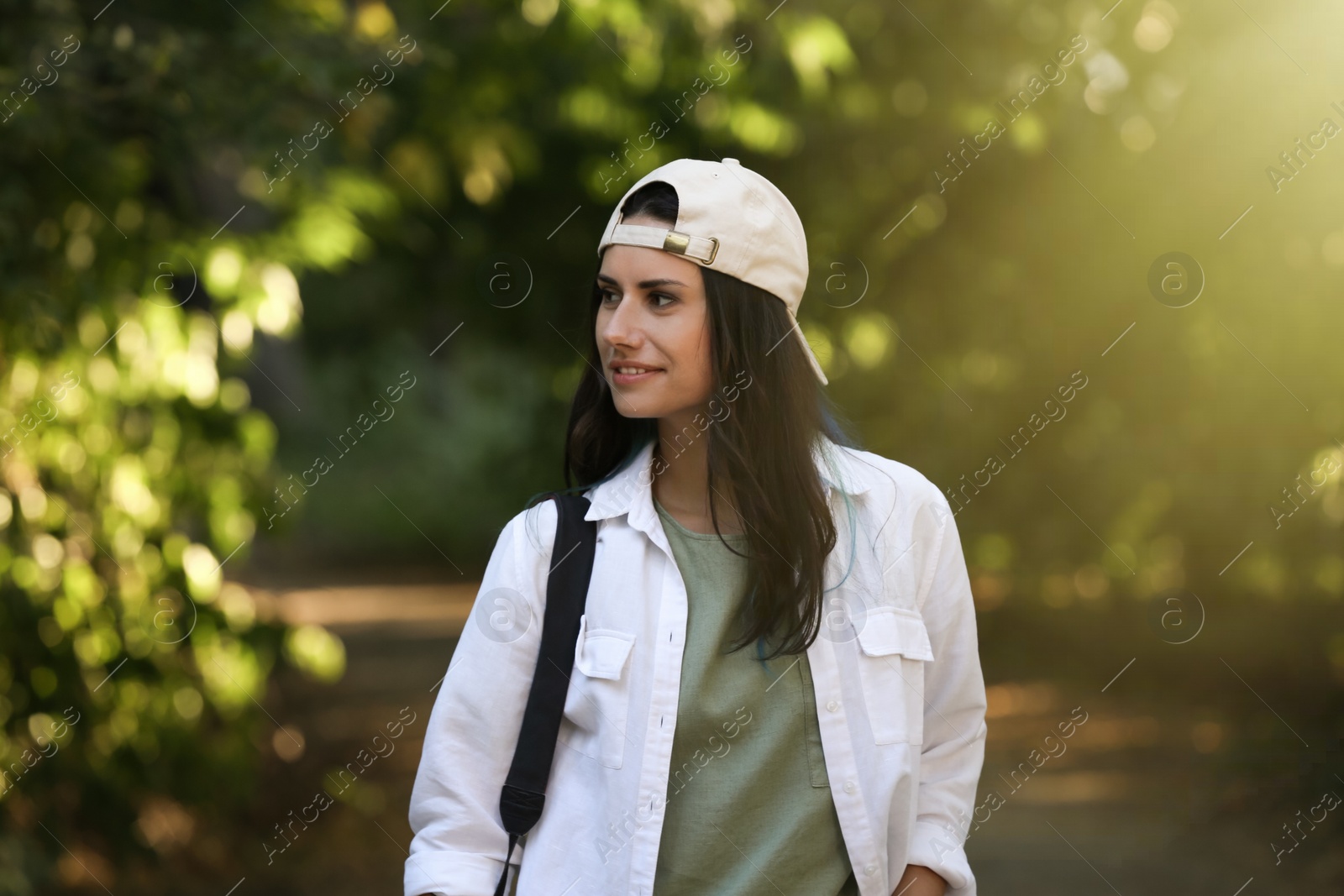 Photo of Beautiful woman in nature reserve on sunny day