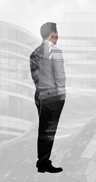 Image of Double exposure of businessman and office buildings