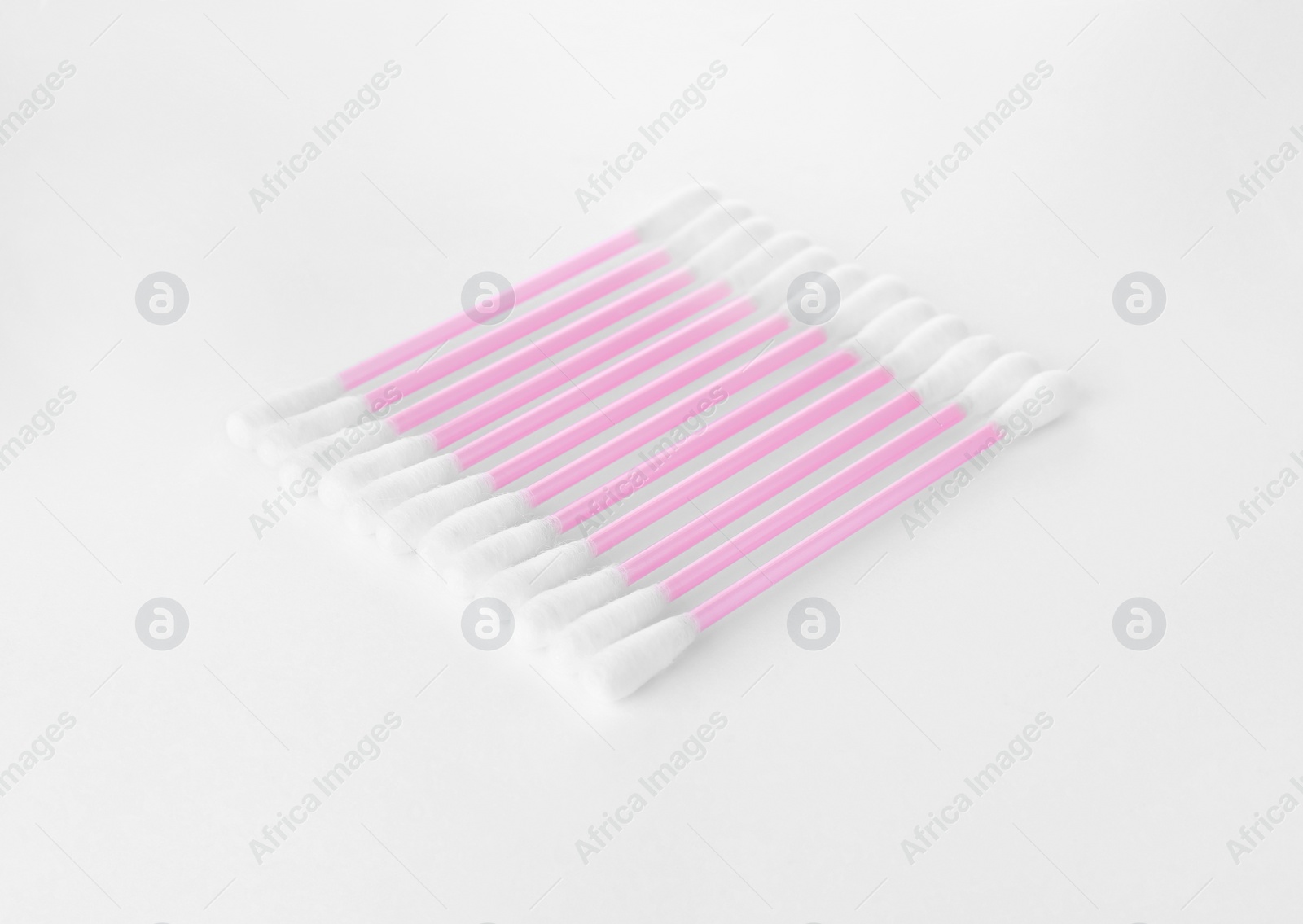 Photo of Clean cotton buds isolated on white. Hygienic product