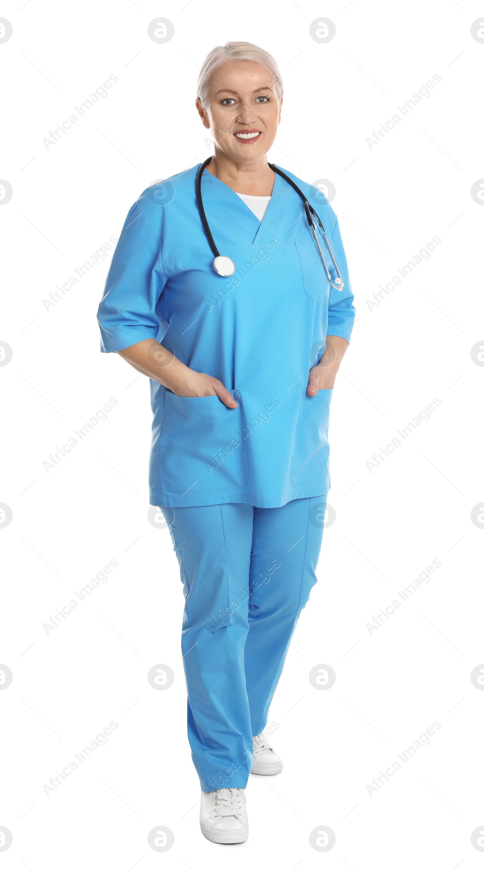 Photo of Full length portrait of mature doctor on white background