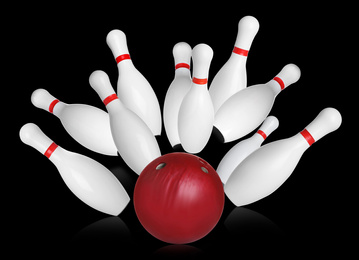 Image of Bowling pins and ball on black background