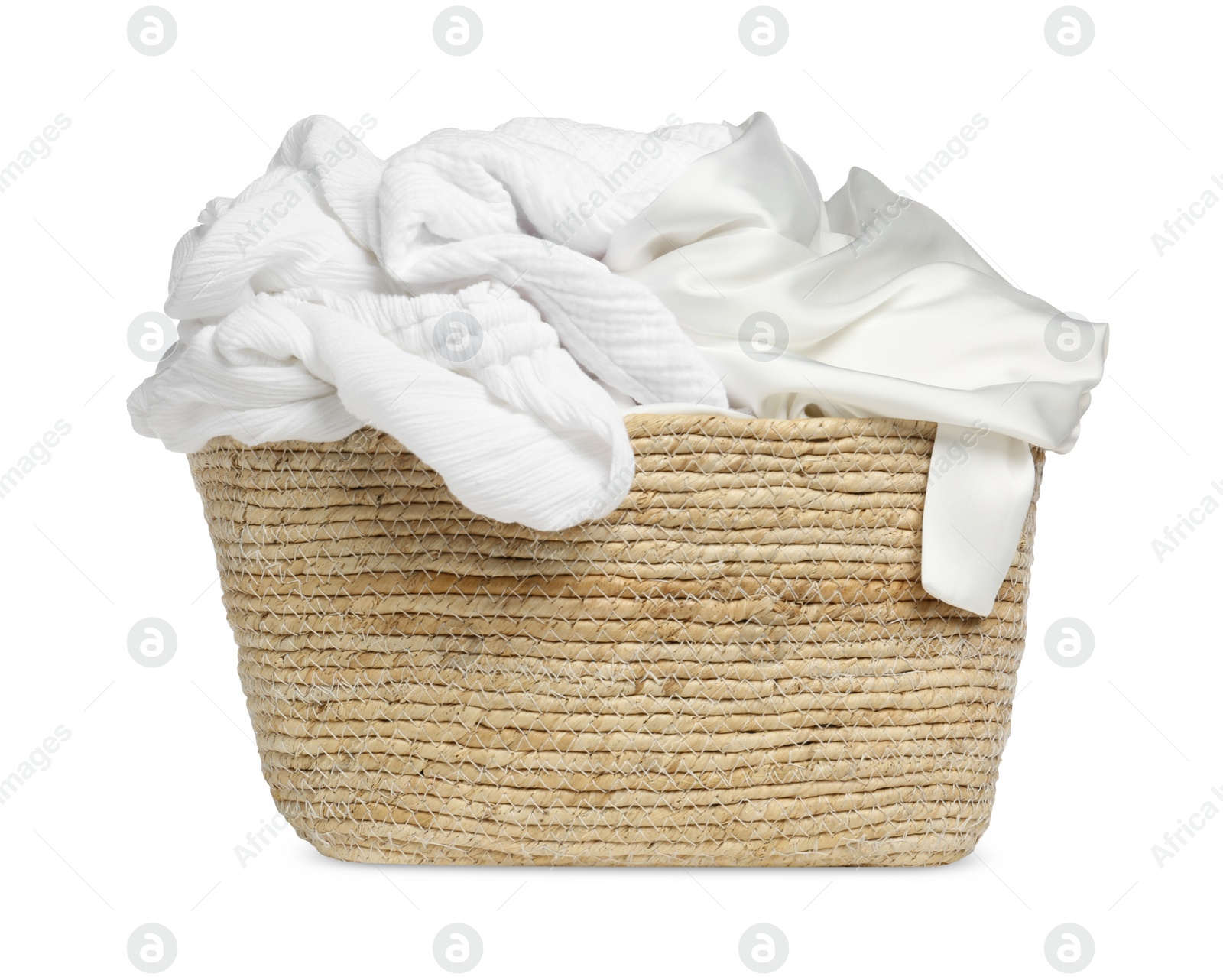 Photo of Wicker laundry basket with clean clothes isolated on white