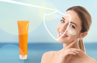 SPF shield and beautiful young woman with healthy skin on blurred background. Sun protection cosmetic product