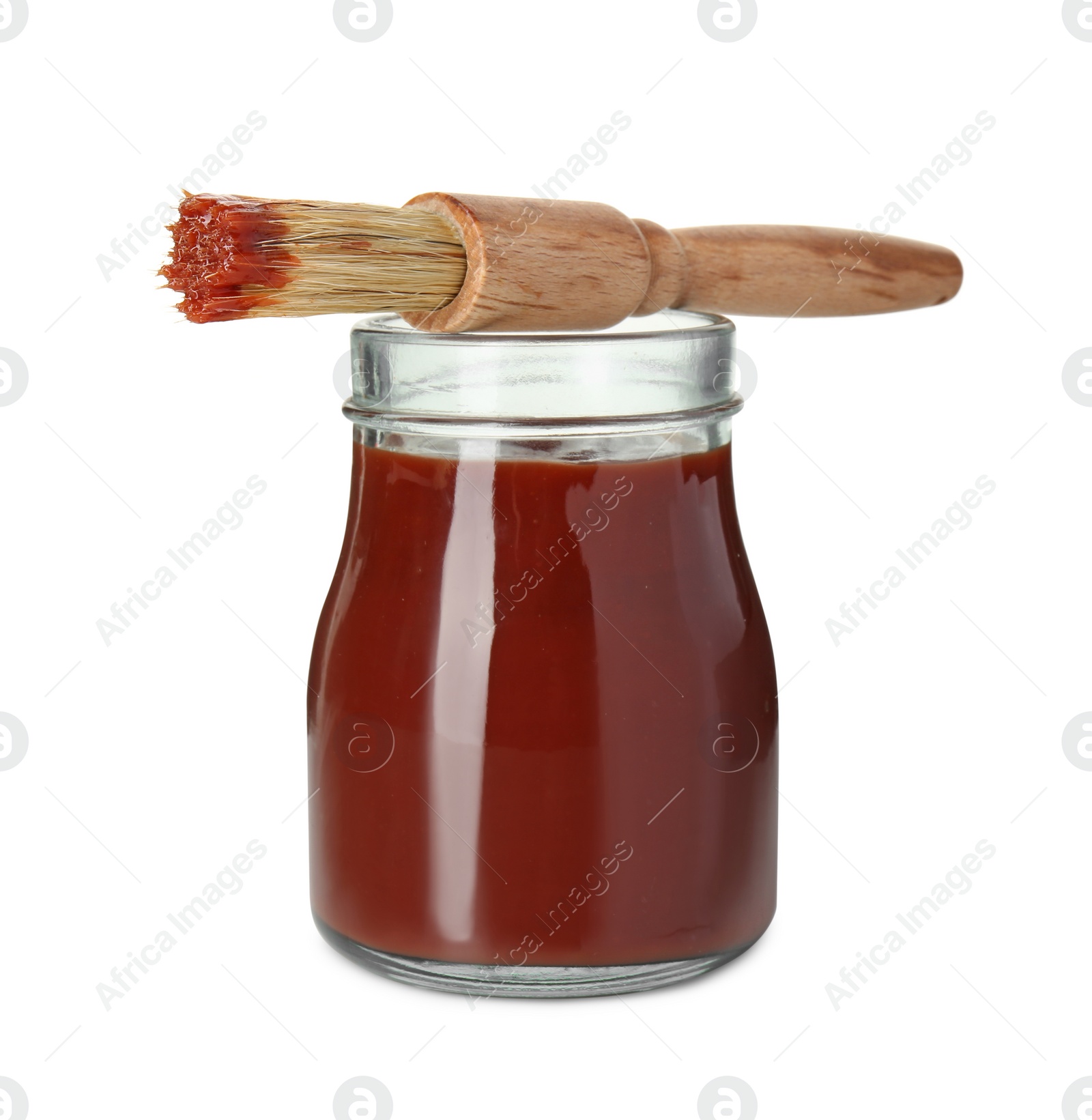 Photo of Brush with tasty barbecue sauce isolated on white