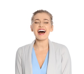 Portrait of young businesswoman laughing on white background