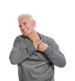 Photo of Mature man scratching chest on white background. Annoying itch