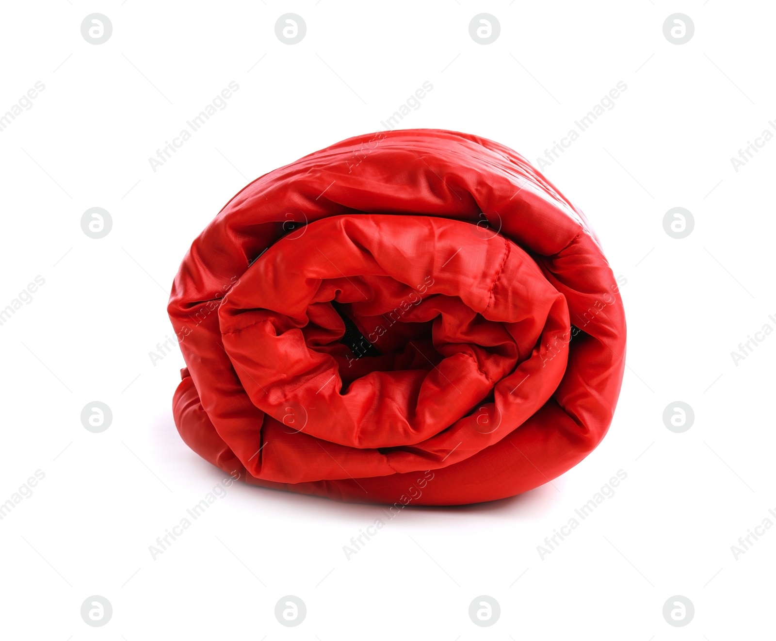 Photo of Rolled sleeping bag on white background. Camping equipment