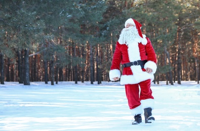Photo of Happy Authentic Santa Claus walking outdoors. Space for text