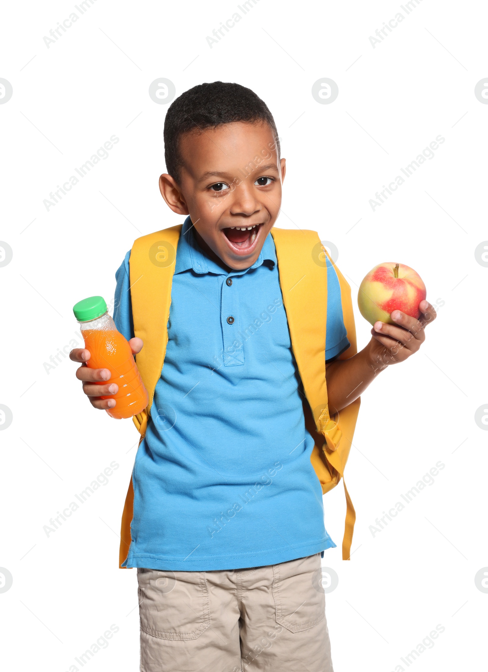 Photo of African-American schoolboy with healthy food and backpack on white background