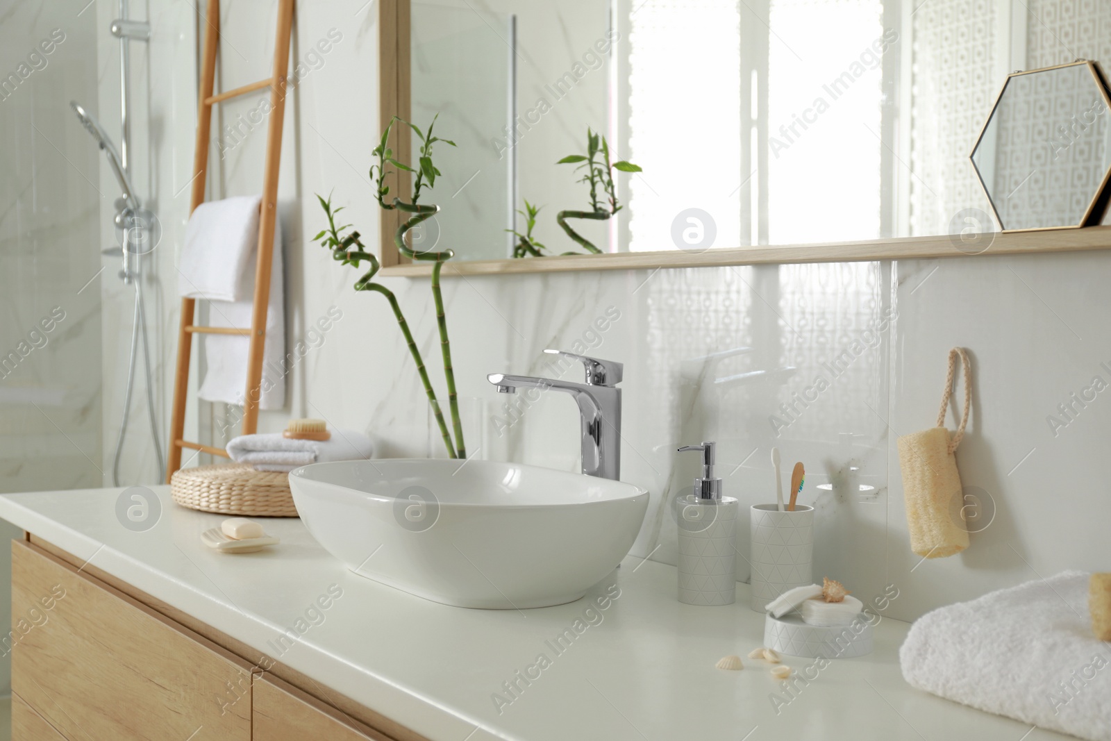 Photo of Stylish white sink in modern bathroom interior