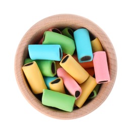 Photo of Bowl with many tasty liquorice candies isolated on white, top view