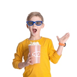 Cute boy in 3D glasses with popcorn bucket isolated on white