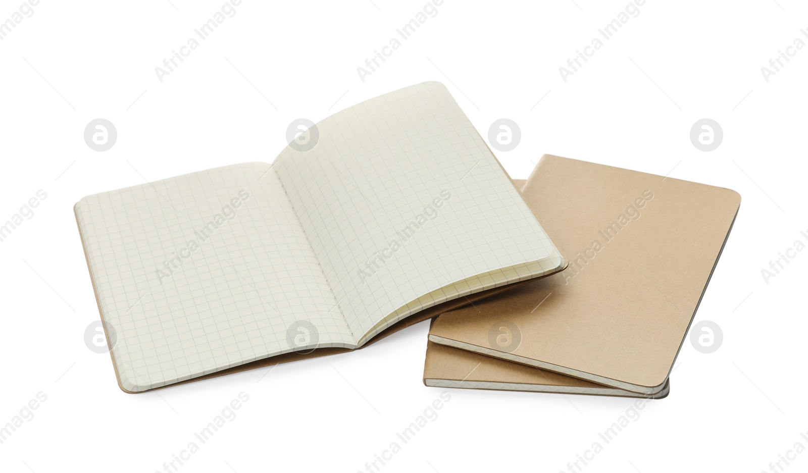Photo of Stylish open notebook with blank sheets and kraft planners on white background