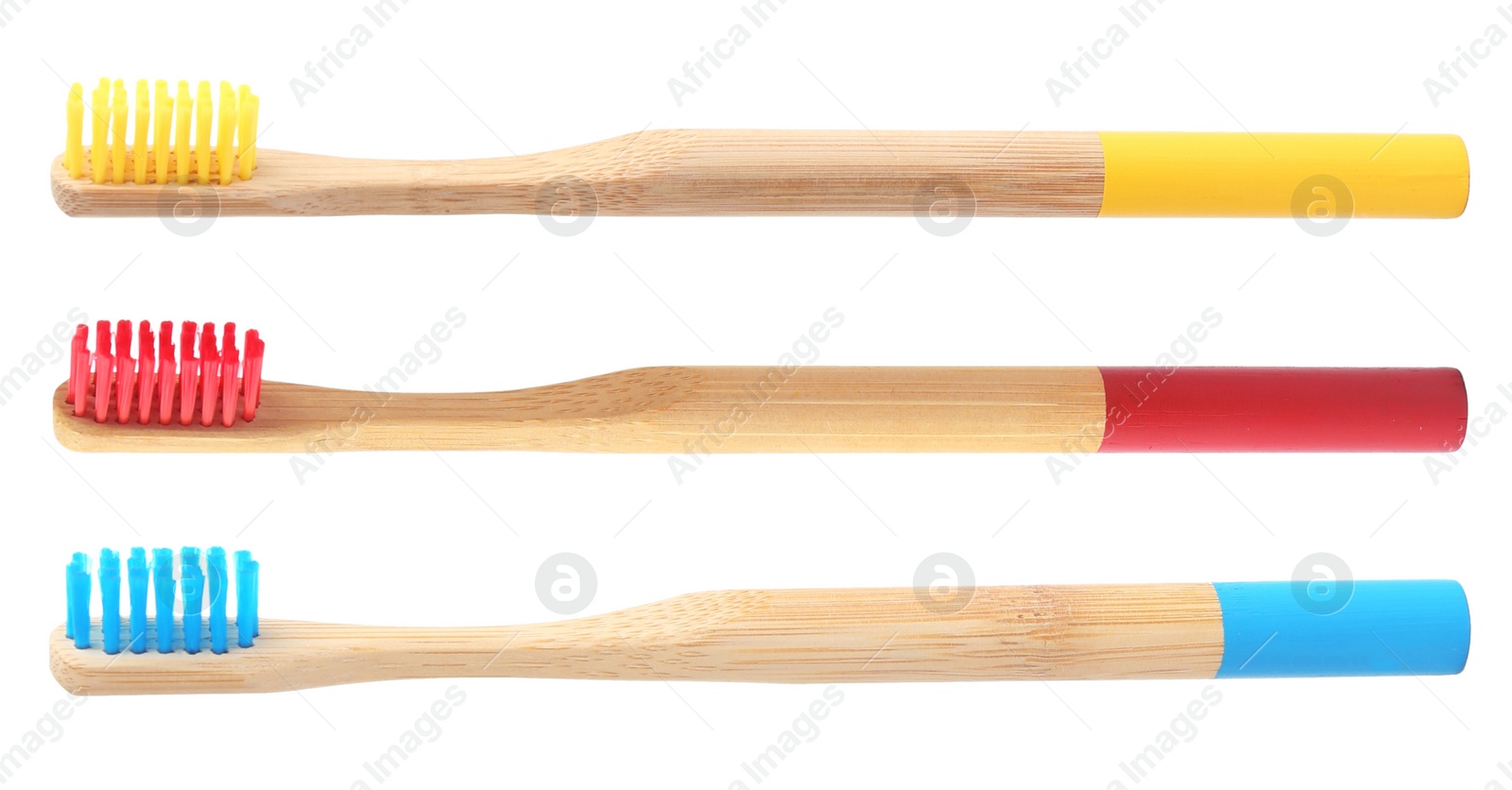 Image of Set of bamboo toothbrushes on white background 