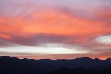 Photo of Picturesque view of beautiful cloudy sky over mountains