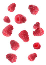 Image of Fresh ripe raspberries falling on white background