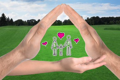 People forming house with their hands and illustration of family against beautiful landscape, closeup