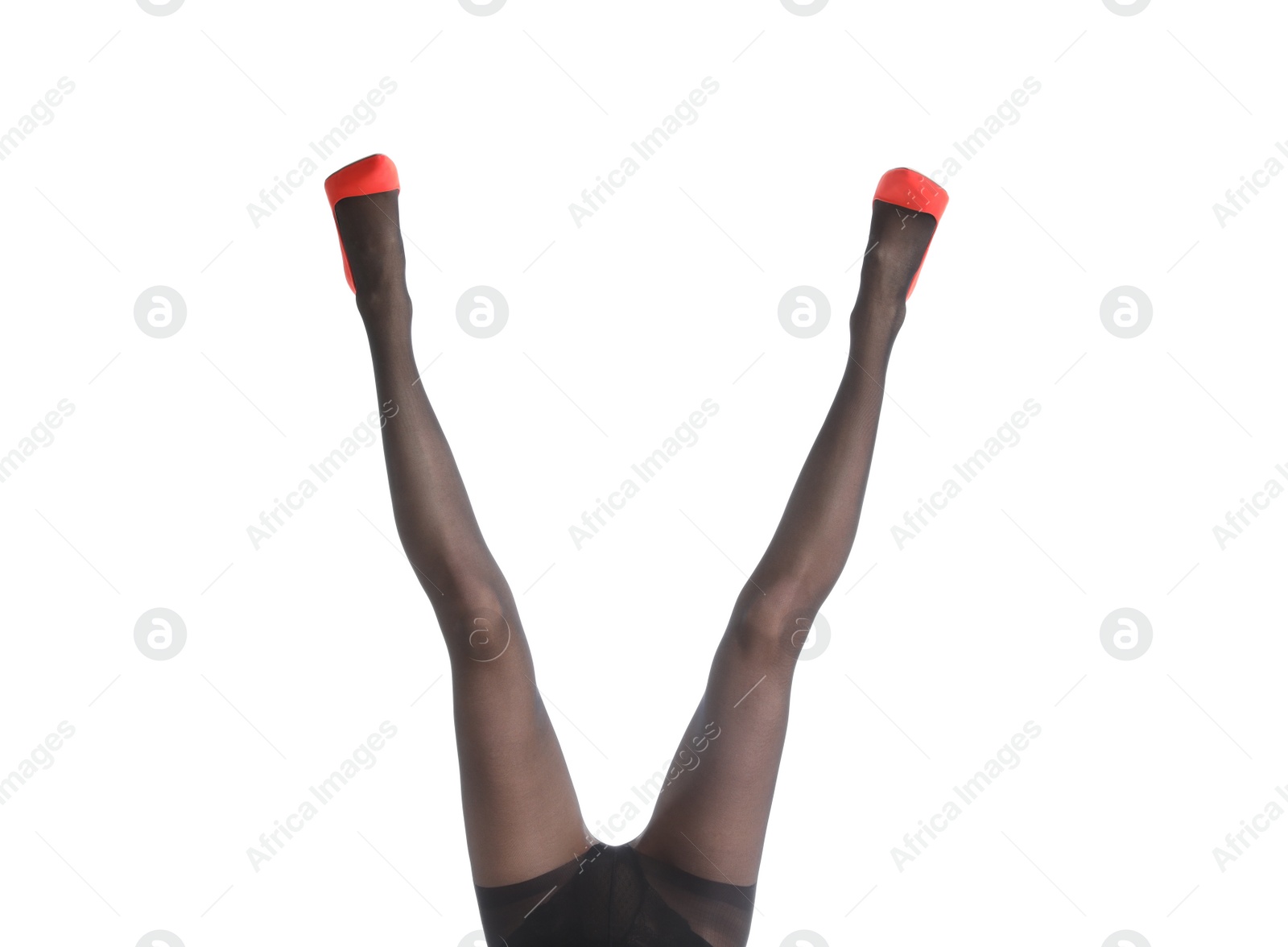 Photo of Woman wearing black tights and stylish shoes isolated on white, closeup of legs