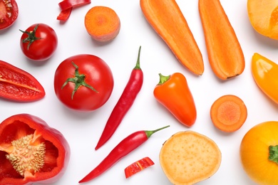 Different fresh vegetables on white background, top view