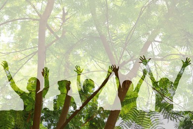 Silhouettes of children and trees outdoors, double exposure