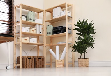 Modern home workplace with wooden storage. Idea for interior design