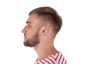 Young man on white background. Hearing problem