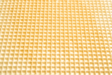 Photo of Tasty wafer as background, closeup. Crispy food