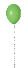 Photo of Green balloon with ribbon isolated on white