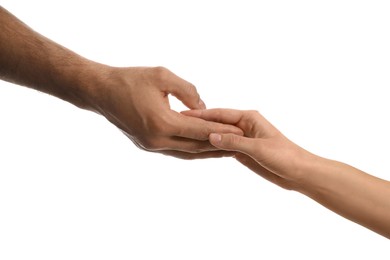 Man and woman holding hands on white background, closeup