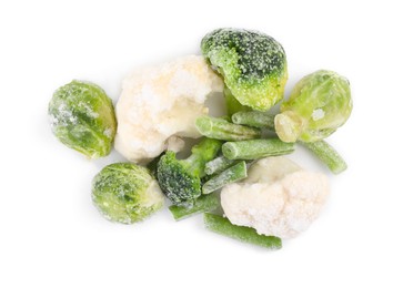 Mix of different frozen vegetables isolated on white, top view