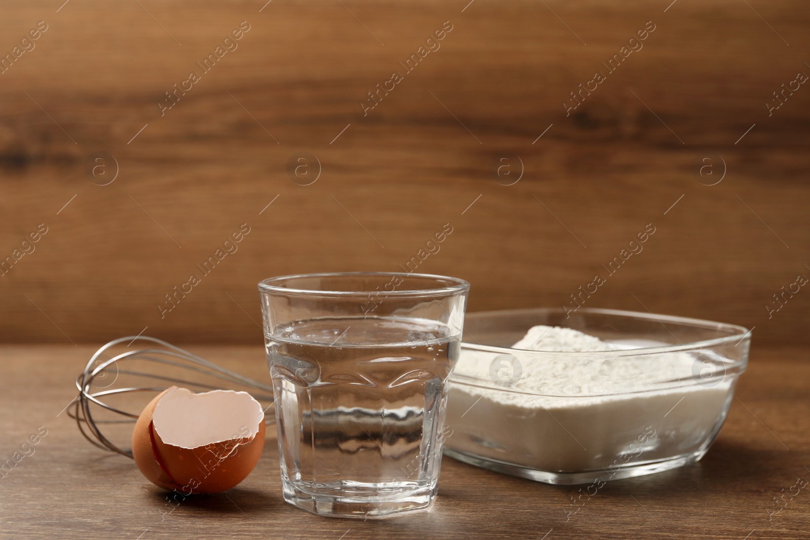 Photo of Cooking scones with soda water. Ingredients for dough on wooden table