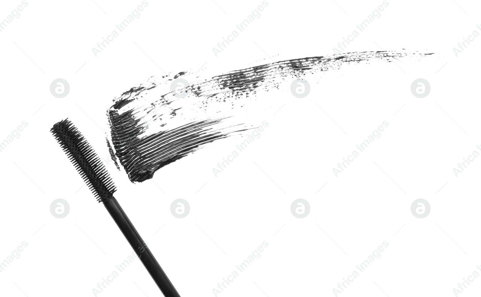 Photo of Smear of mascara and applicator isolated on white, top view