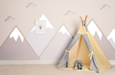 Image of Cozy child room interior with play tent 