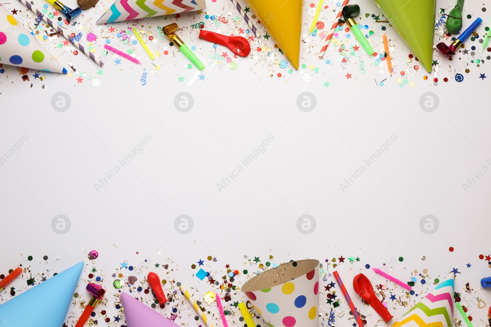 Photo of Beautiful flat lay composition with festive items on white background, space for text. Surprise party concept