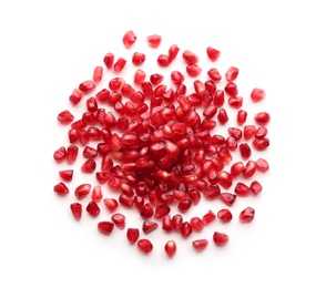 Photo of Pomegranate seeds on white background, top view. Delicious fruit