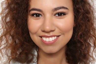 Photo of Portrait of young African-American woman with beautiful face, closeup