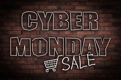 Image of Text Cyber Monday Sale on brick background