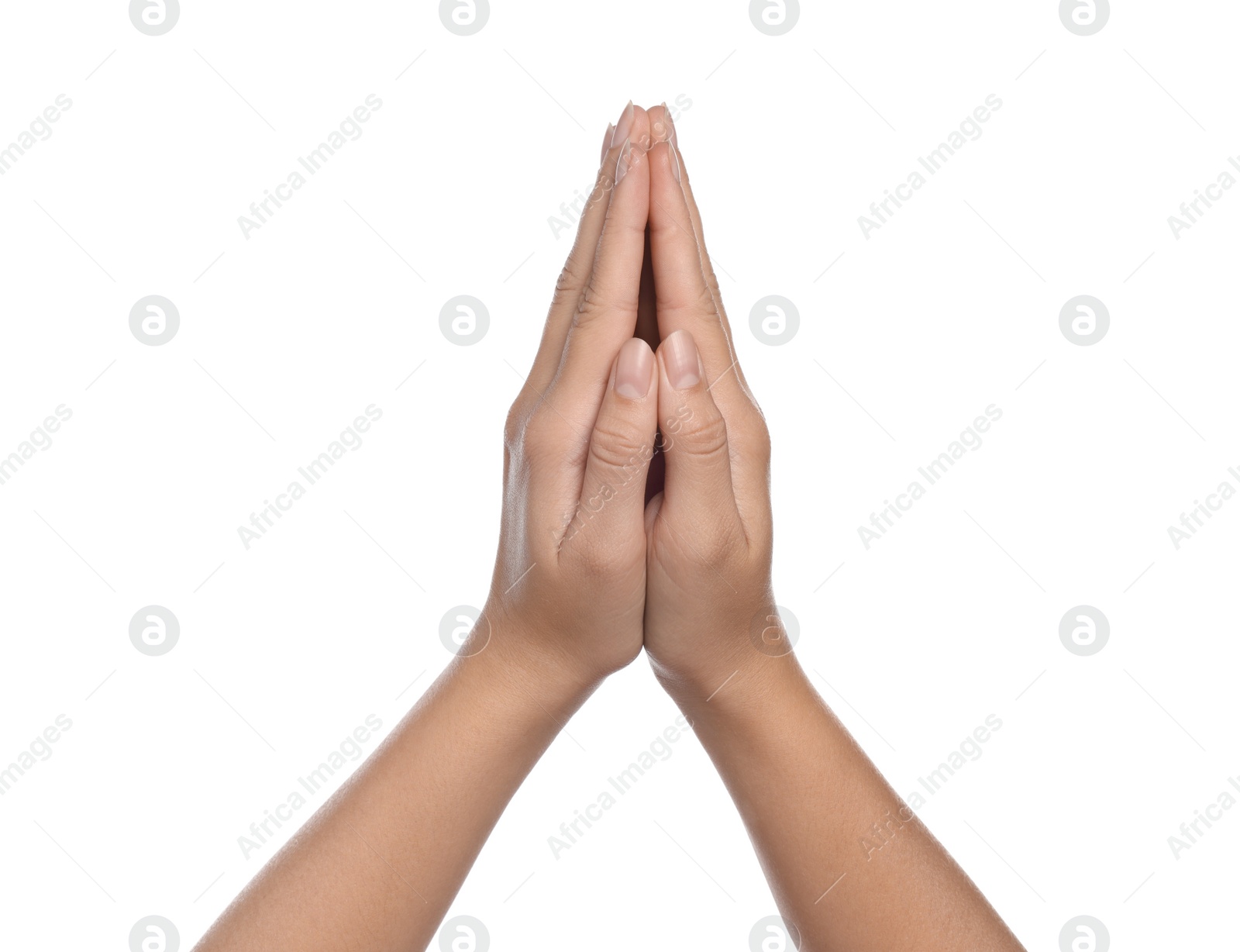 Photo of Woman holding hands clasped while praying on white background, closeup